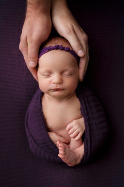 Cape Girardeau newborn photographer, perryville newborn photographer, baby wide awake, baby photo, baby girl, bed