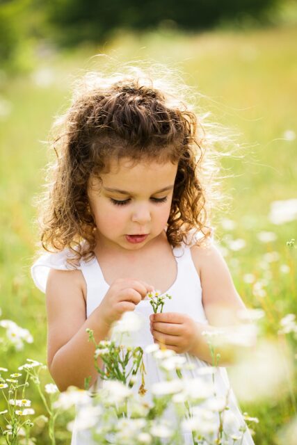 Cape Girardeau photographer, Farmington photographer, summer photoshoot, white flowers, little girl