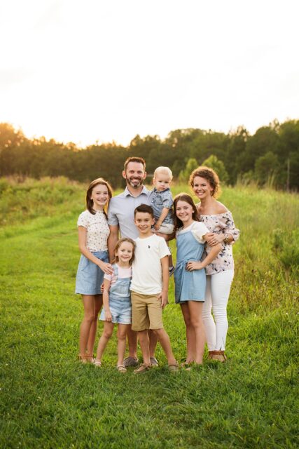 perryville photographer, Cape Girardeau photographer, Farmington newborn photographer, family of 7, summer photos, sunset photoshoot, blue and white shirts