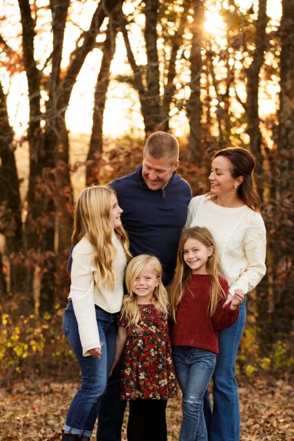 perryville family photographer, Cape Girardeau family photographer, Farmington family photographer, sunset, golden sun, family photos, daughters, laughing