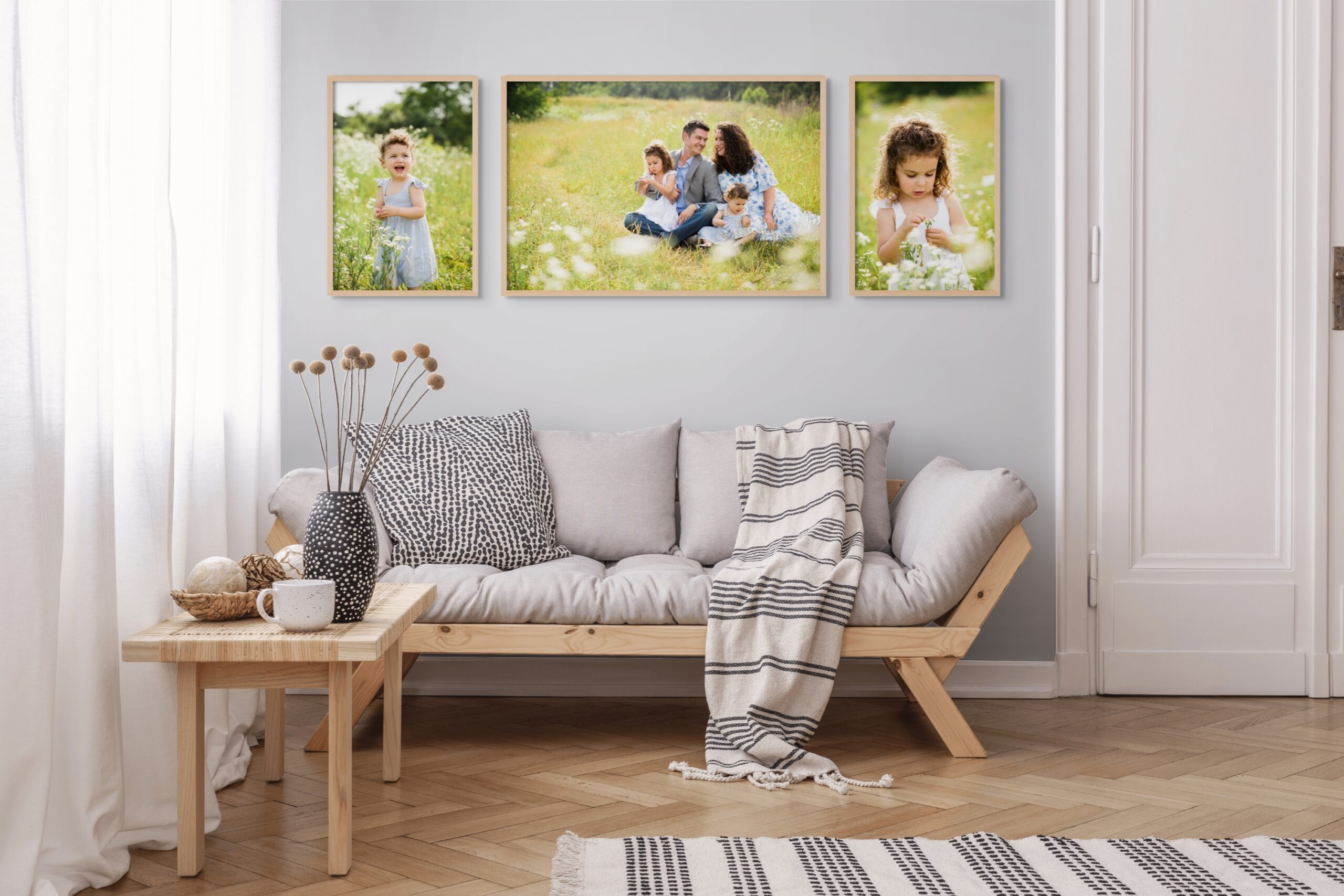 perryville newborn photographer, living room, family pictures on wall, modern room