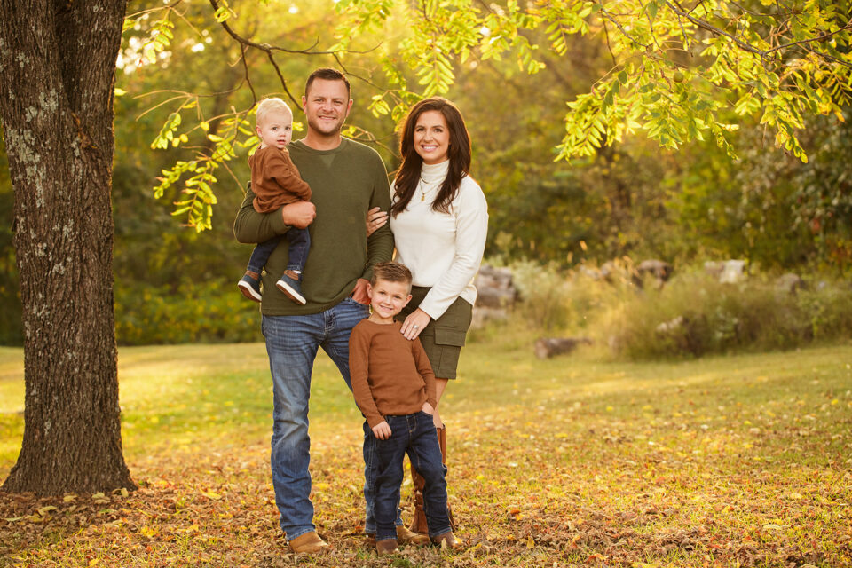 perryville family photographer, Cape Girardeau family photographer, Farmington newborn photographer, fall colors, family photos, outside photos, sons, green trees