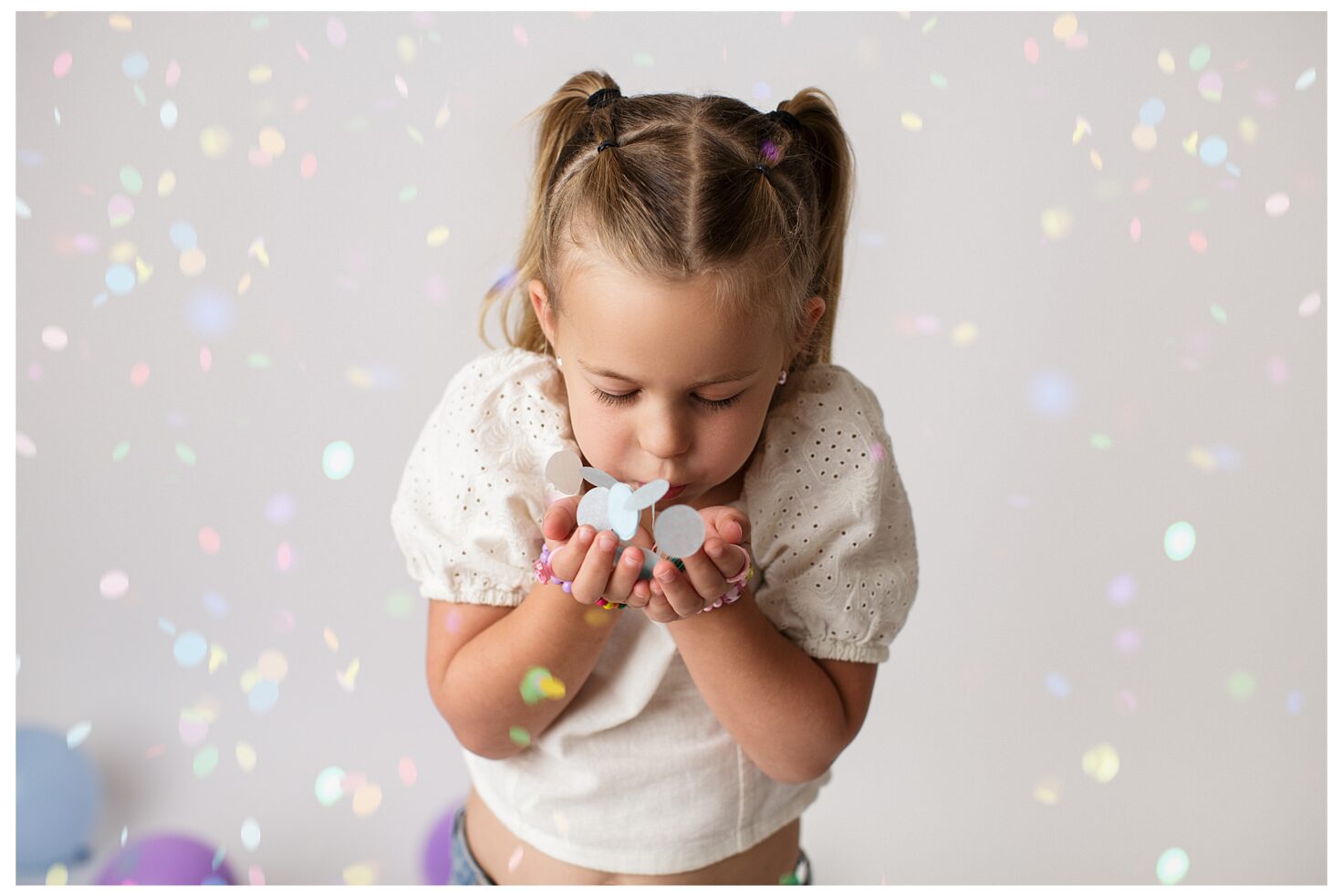 st louis mini sessions, Cape Girardeau missouri mini session, Perryville missouri newborn photographer, Jackson missouri mini sessions, south county missouri mini sessions, Chester Illinois mini sessions, rainbow, confetti, balloons, sparkle session, little girl, white backdrop, bokeh