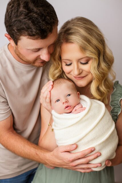 Cape Girardeau newborn photographer, perryville newborn photographer, family newborn photo, baby wide eyes