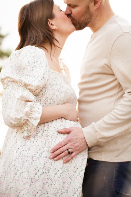 dad holding pregnant belly, st Louis missouri maternity photographer, Farmington missouri maternity photographer, gold sunset mom, Cape Girardeau maternity photographer, perryville maternity photographer