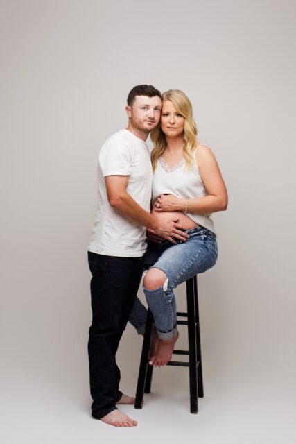 perryville maternity photographer, Cape Girardeau maternity photographer, studio photography, white backdrop, mom and dad, modern studio maternity photos