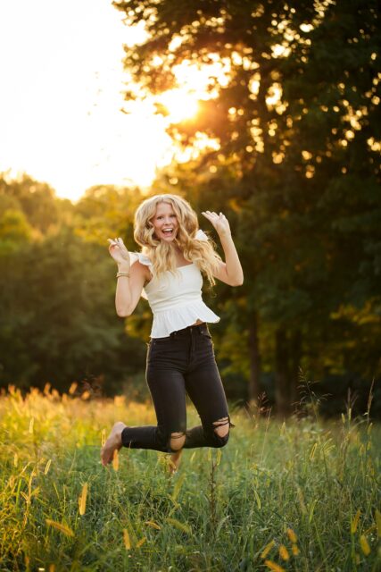 perryville senior photographer, Cape Girardeau senior photographer, Farmington senior photographer, field, golden sun, tall grass, jump, summer photos