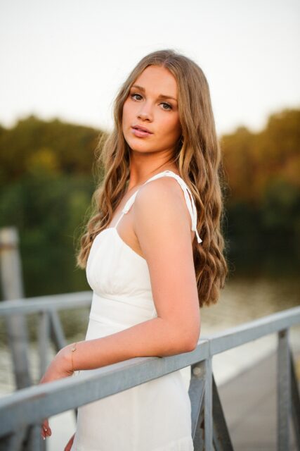 perryville senior photographer, Cape Girardeau senior photographer, Farmington senior photographer, dock, white dress, gentle light, Saxony high school