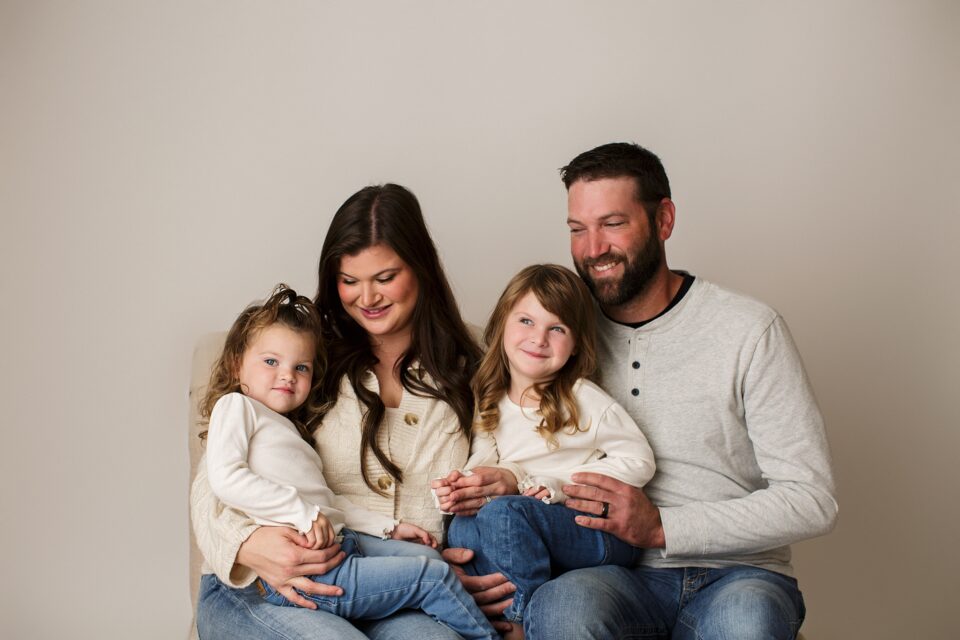 Cape Girardeau newborn photographer, perryville photographer, Farmington newborn photographer, studio, white backdrop, neutral, little girls, blue jeans, sitting on bench