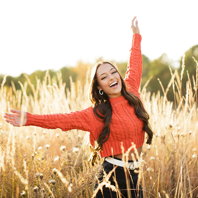 perryville senior photographer, Cape Girardeau senior photographer, field of tall grass, sunset, golden sun, high school senior