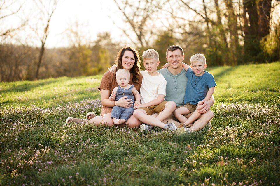 farmington Missouri Newborn photographer, CAPE GIRARDEAU newborn photographer, st Louis newborn photographer, family of boys, family in field, family smiling, photoshoot