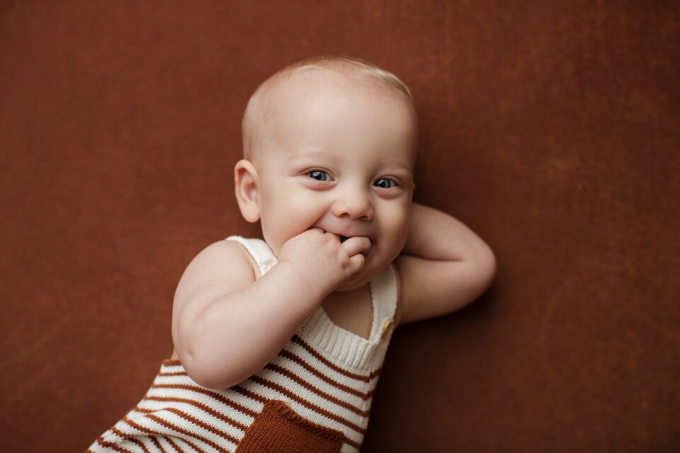 perryville missouri newborn photographer, farmington missouri newborn photographer, st Louis missouri newborn photographer, Cape Girardeau missouri newborn photographer, gold, burnt orange, baby smiling, giggles, milestone photography, 8 months